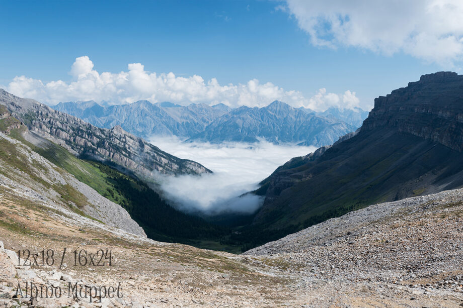Mountain landscape with fog in valley and clouds in sky, Banff National Park landscape scenery