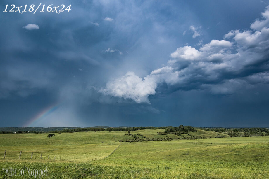 Alberta landscape, large thunderstown with rainbow and farm fieldAlberta landscape, large thunderstown with rainbow and farmland