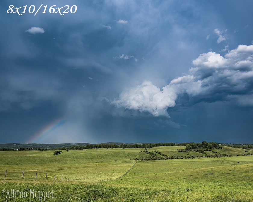 Alberta landscape, large thunderstown with rainbow and farm fieldAlberta landscape, large thunderstown with rainbow and farmland